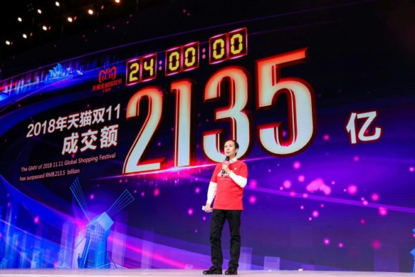 Alibaba CEO Daniel Zhang speaks in front of a screen showing total sales at over 213.5 billion yuan (30.7 billion USD) shortly after the end of the 11.11, or “Singles Day” shopping festival. AFP Picture