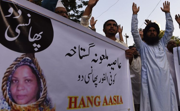 Protesters want Asia Bibi hanged as lawyer flees to Europe
