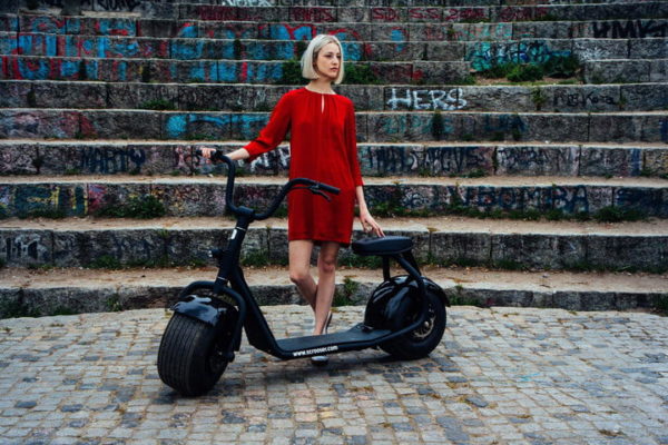 Car companies are investing in scooters and bikes as mobility of the future . Above a Scrooser