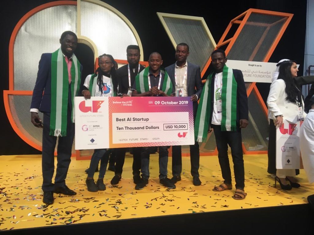 R-L: Abdulhakim Bashir,CEO Chiniki Guard with his award of 10,000 USD for best Artificial Intelligence solution at GITEX