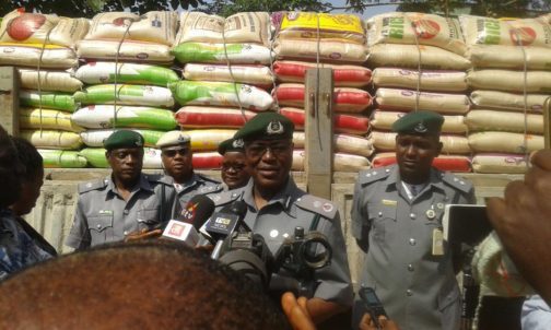 Nigeria Customs Service addressing the media on the seized bags of rice