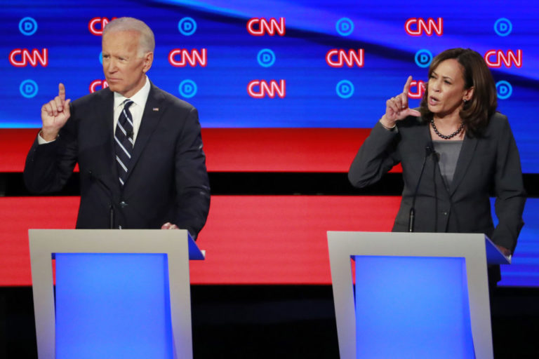 Former Vice President Joe Biden and U.S. Senator Kamala Harris gesture on the second night of the second 2020 Democratic U.S. presidential debate in Detroit, Michigan