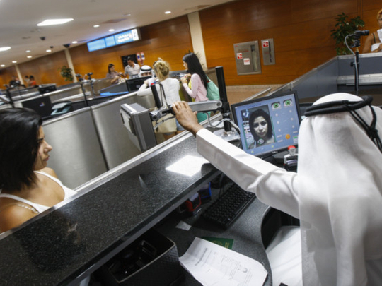 [Illustrative image] A passenger going through an eye scan on arrival at Dubai airport Terminal 1